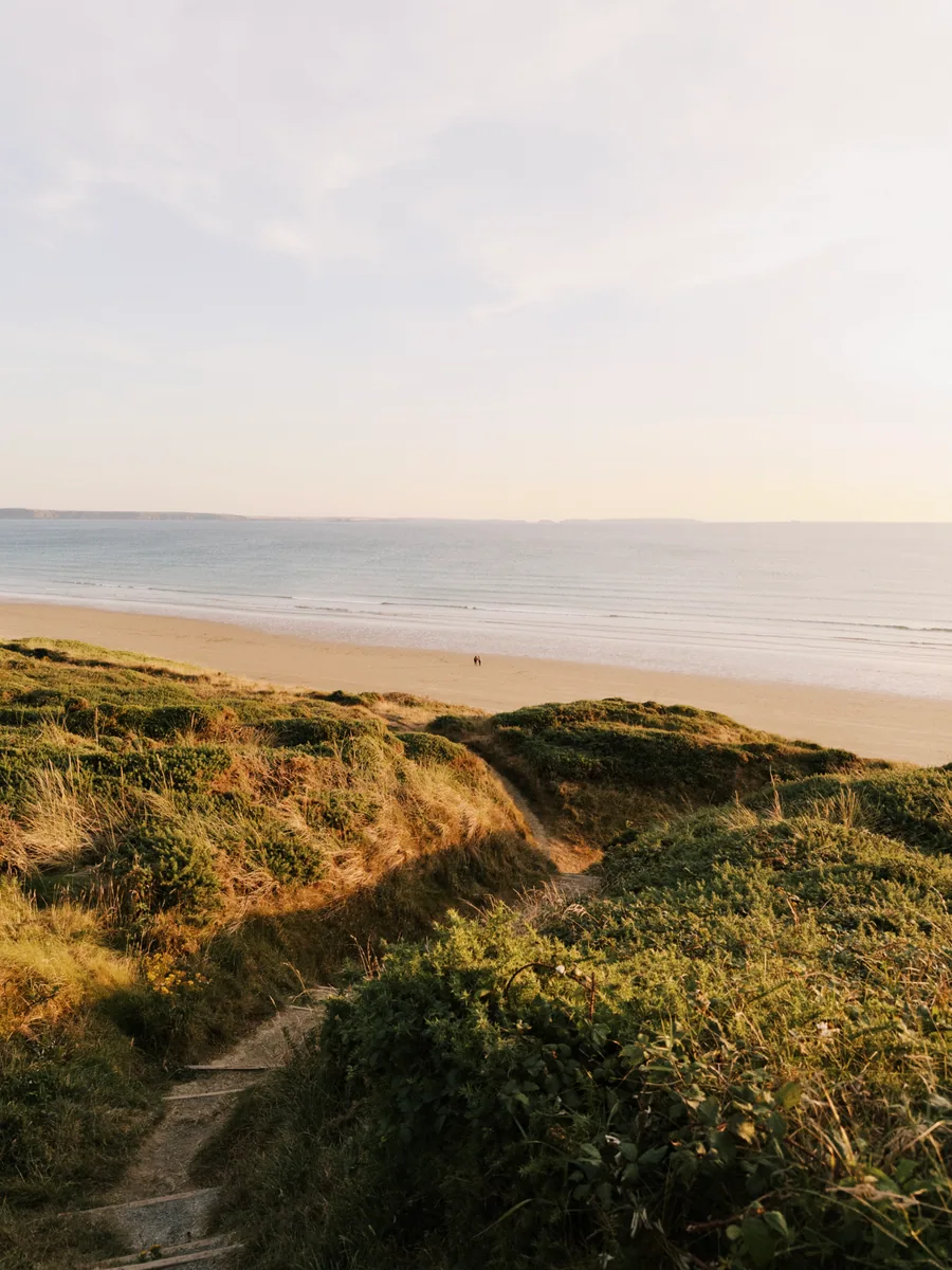 Coastal path leading down to a beach